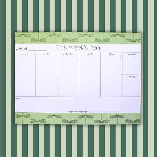 Weekly planner with dragonfly design on a striped green and white background